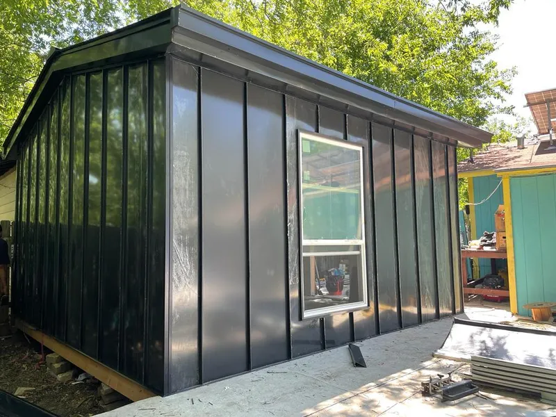 Black standing seam metal wall panels for Roof Inspection in Pekin